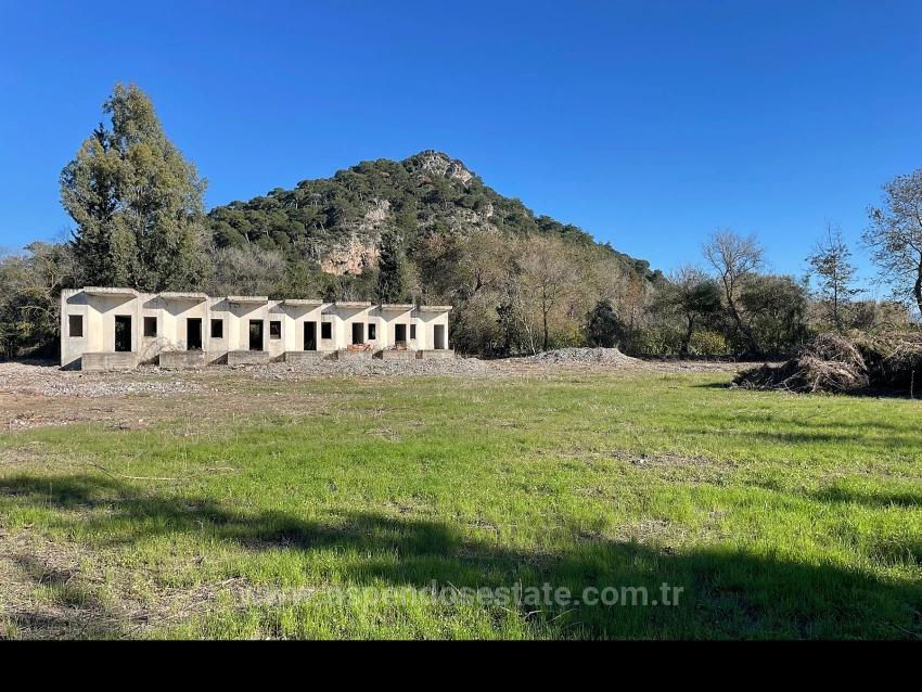 Dalyan Gülpınar'da Anayola Sıfır 9,037M2 Satılık Arsa